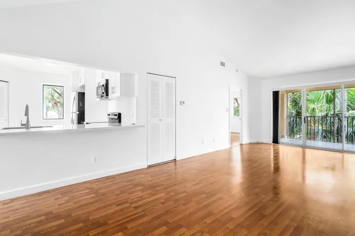 Large combo dining and living room open to the kitchen
