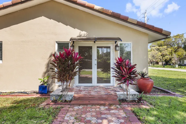 Metal awning with french door entry