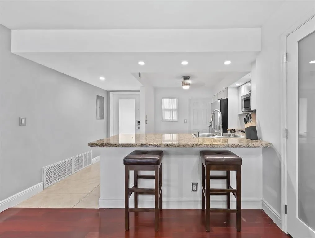 Kitchen with eat in breakfast bar