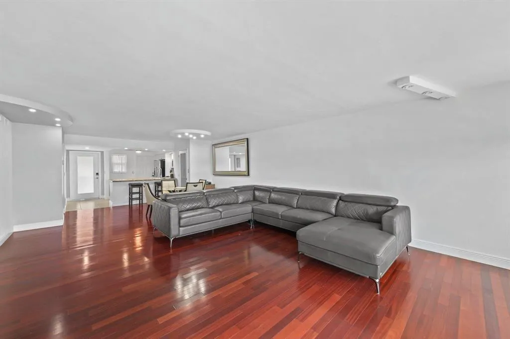 This open concept Living Room, Dining room, Florida Room is very spacious and offers amazing canal views to watch the boats and relax.