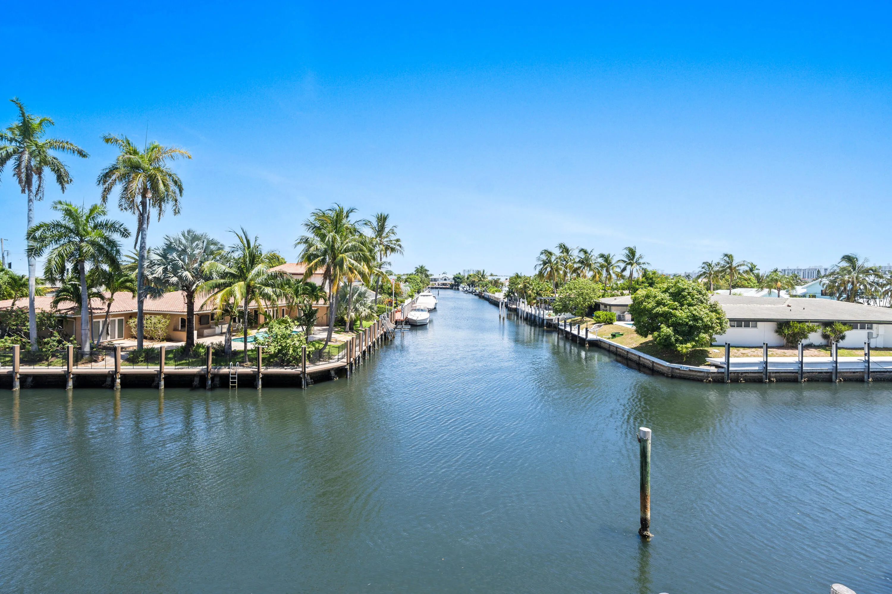 COASTAL LIVING AT ITS BEST FOR BEACH & BOAT LOVERS IN LAUDERDALE BY THE SEA. THIS NICELY REMODELED UNIT FEATURES 1300 SQ FT, 2 BEDROOMS 2 BATHROOMS LOCATED DIRECTLY ON THE CANAL W/ AMAZING WATER VIEWS ONLY 600 FT FROM THE INTRACOASTAL. KITCHEN FEATURES WHITE SHAKER CABINETS, STAINLESS STEEL APPLIANCES W/ GRANITE COUNTERTOPS, & IN UNIT WASHER/ DRYER. PRIMARY BEDROOM ALSO HAS WATER VIEWS W/ WALK IN CUSTOM CALIFORNIA STYLE CLOSET. UPDATED BATHROOMS, NO FIXED BRIDGES, 3 HEATED POOLS, 3 BBQ AREAS, TIKI HUT.