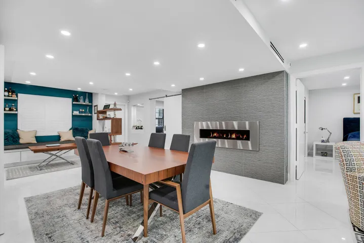Dining area with modern imported decorative fireplace