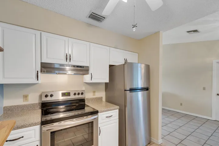 East side of kitchen into dining area.