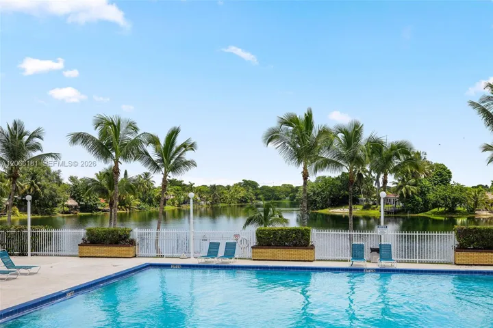 Primary swimming pool overlooking lake