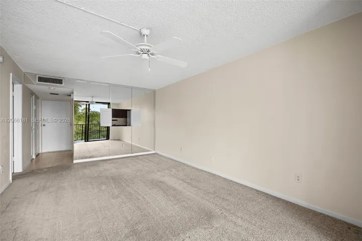 View of dining room, foyer and reflection of lake