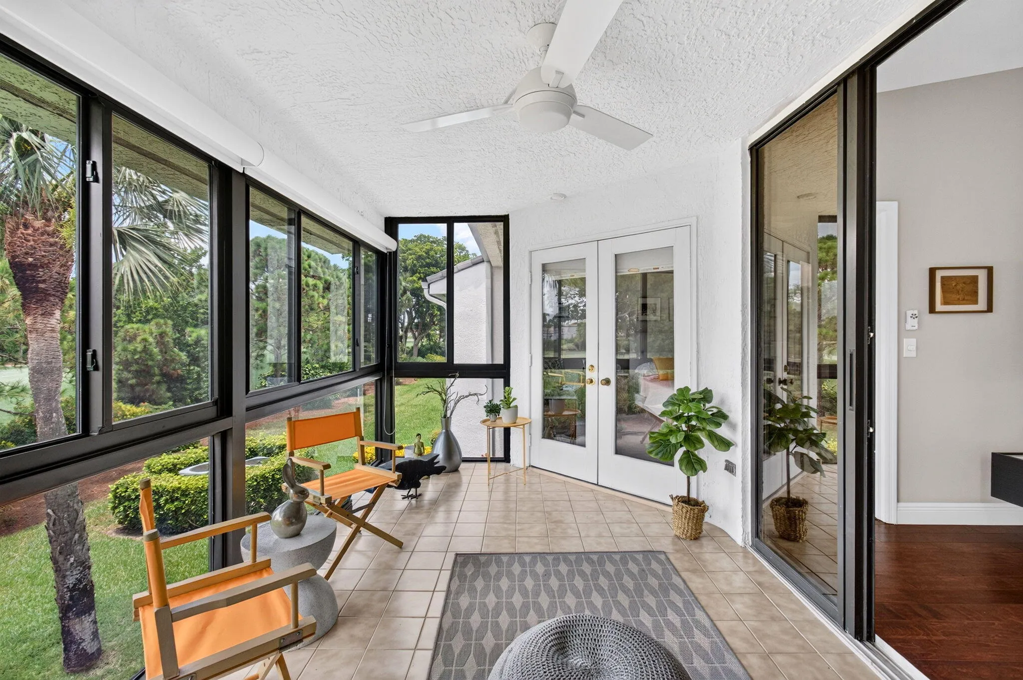 with French Doors Leading to Primary Bedroom & Sliders Leading to Living Room
