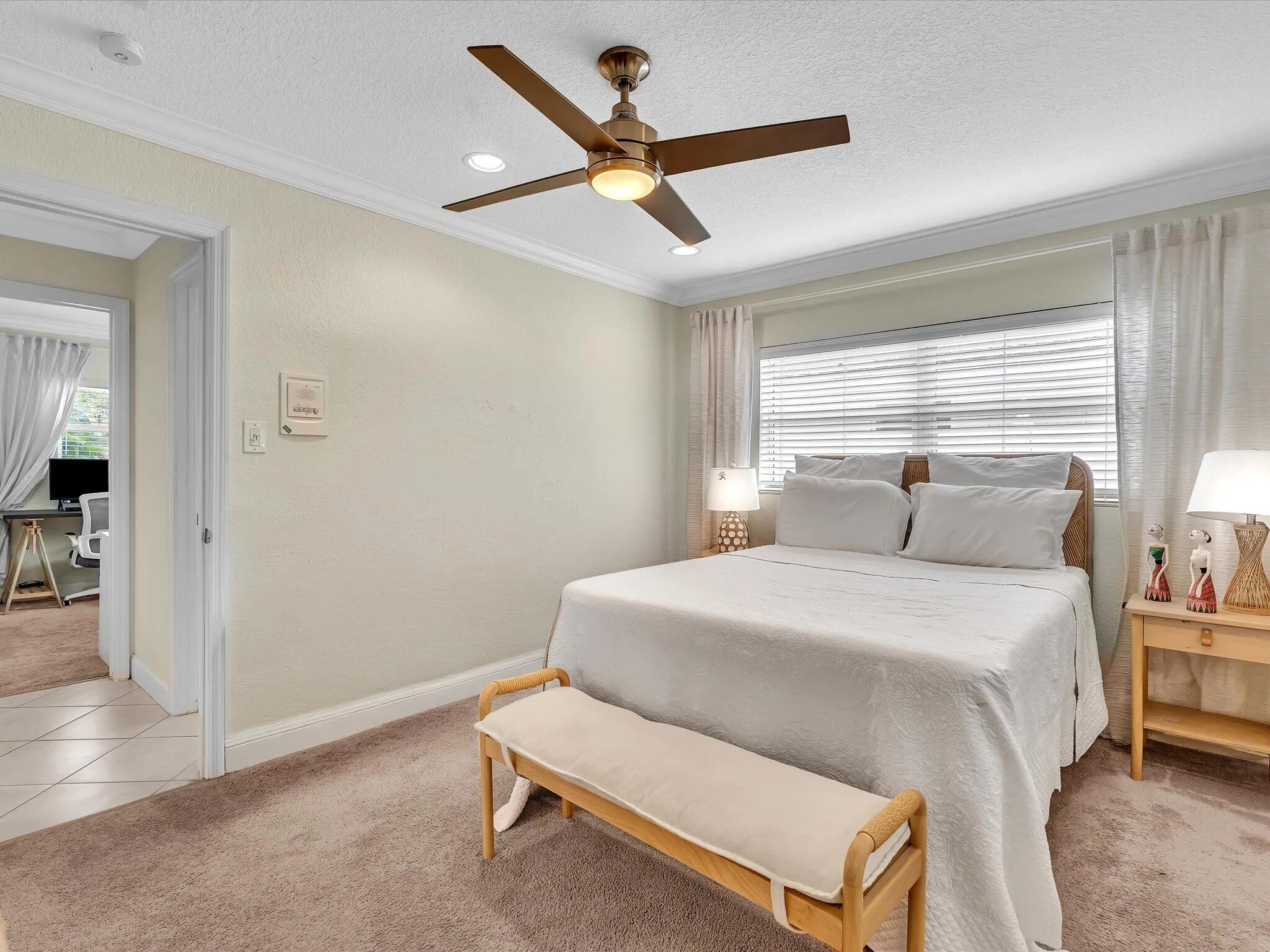 Ceiling fan with integrated lighting, recessed lighting, crown molding, window with blinds and sheer curtains, and carpeted flooring
