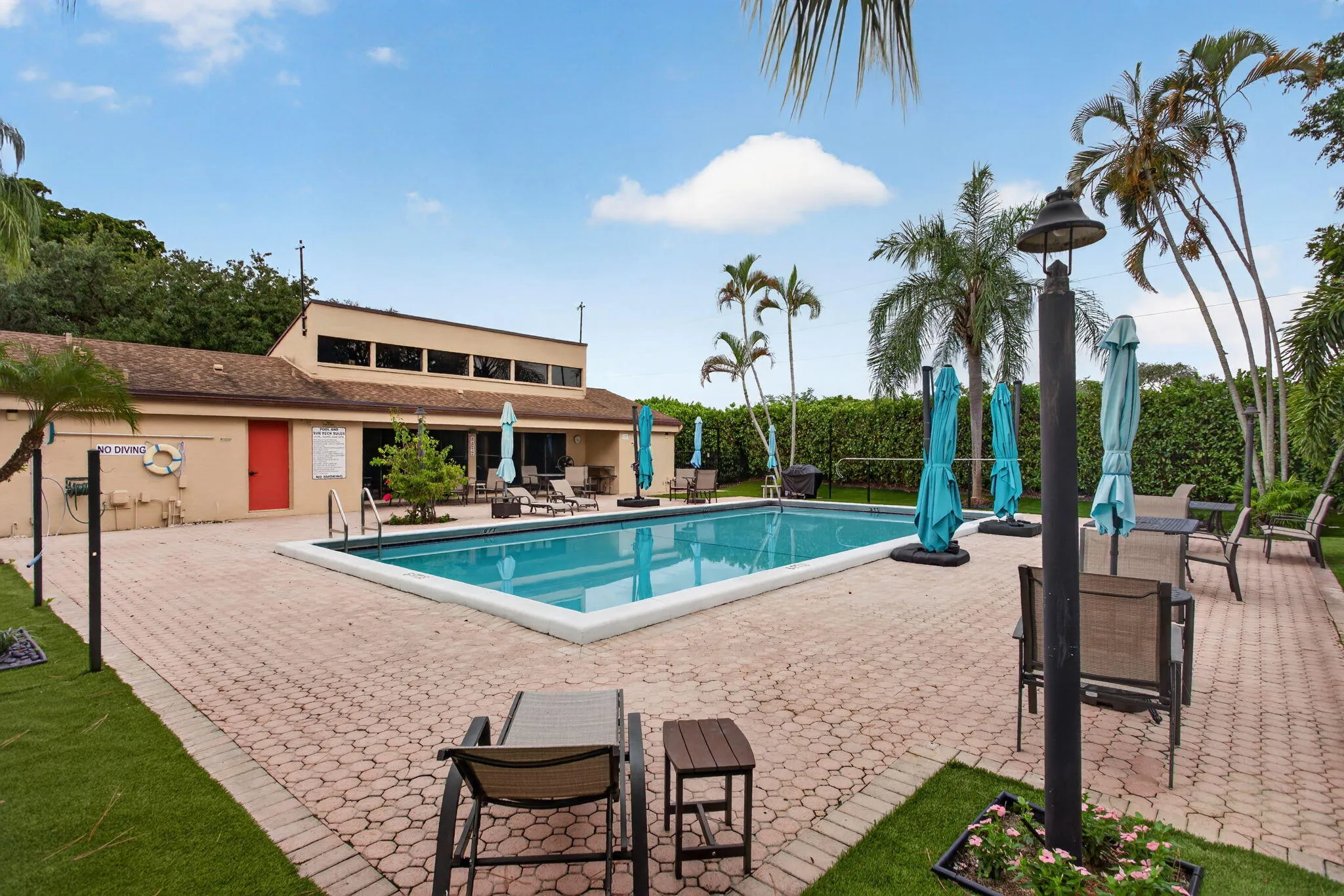 POOL IS RIGHT ACROSS THE DRIVEWAY