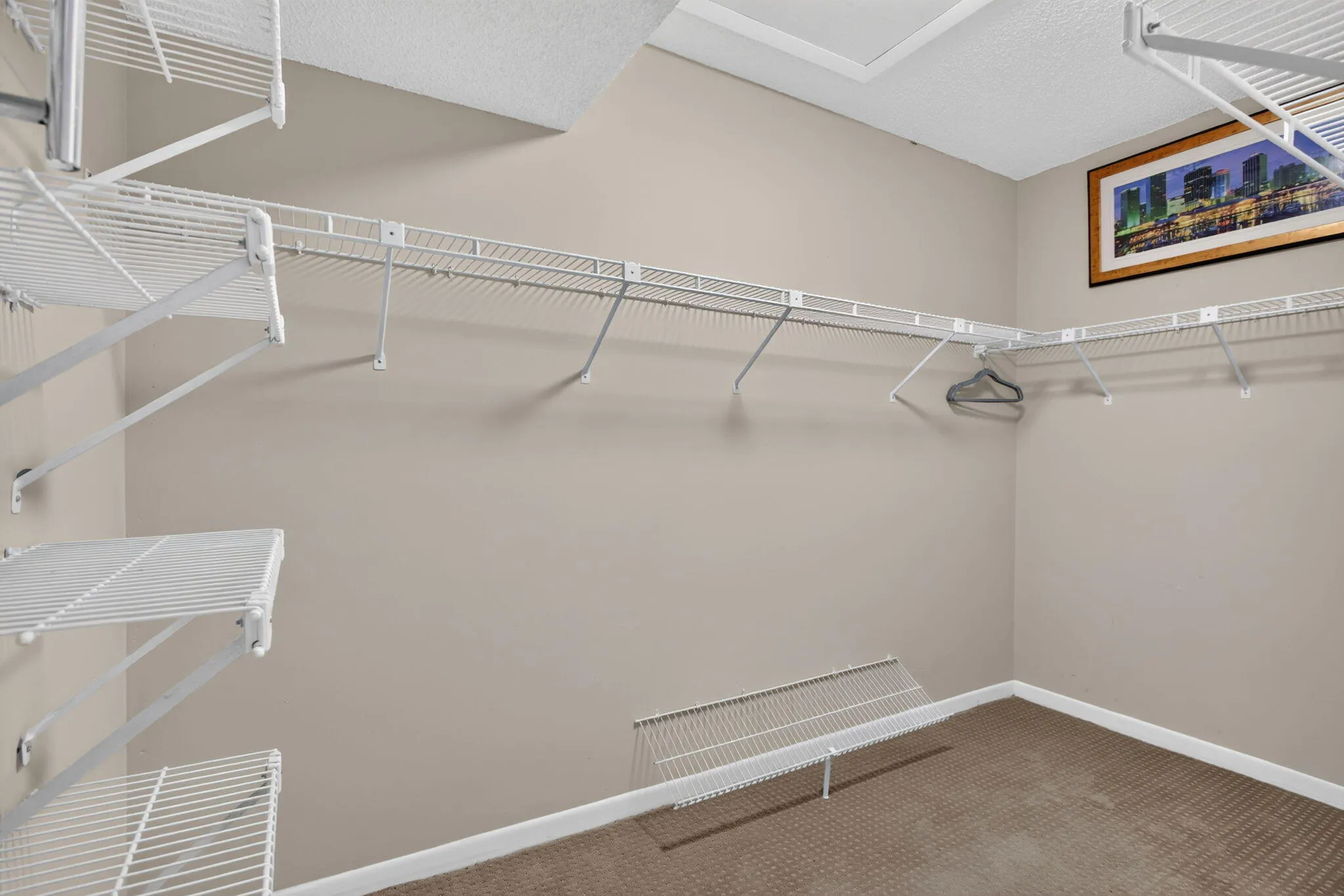 LARGE WALK IN CLOSET MAIN BEDROOM