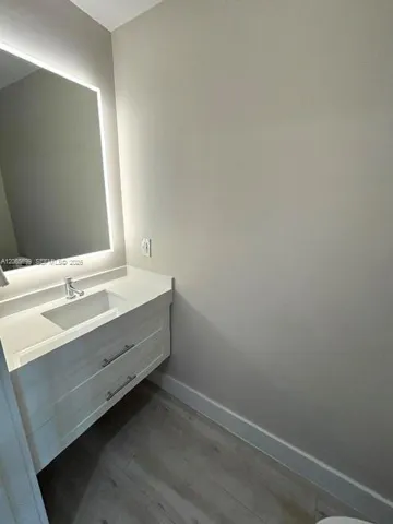 guest bathroom at entrance condo