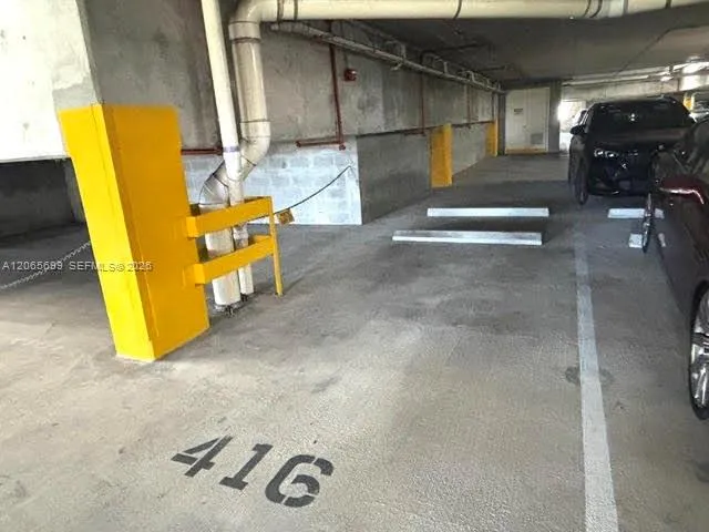assigned parking next to elevator corner spot