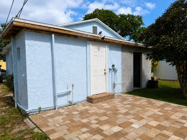 utility area with paver patio