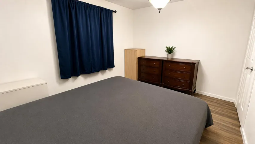 Wide-angle bed view — king-size bed