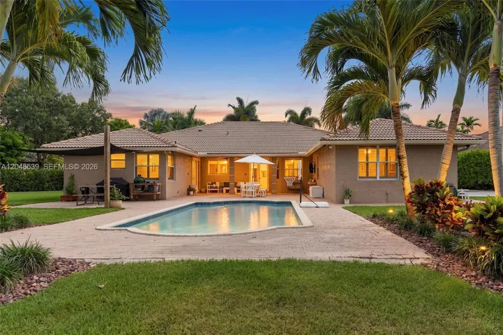 Up-lights throughout backyard to highlight palms
