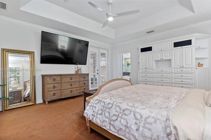 Bedroom has private access to covered patio