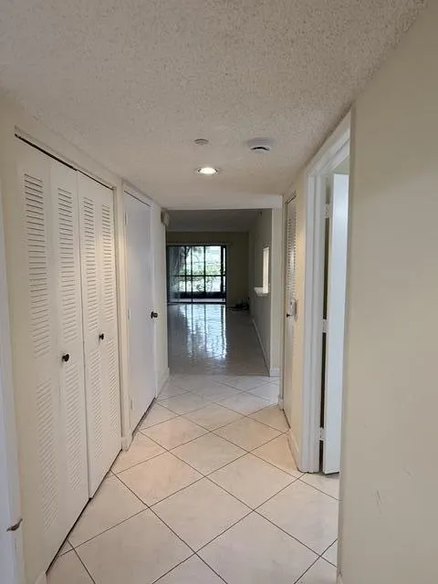 Hallway with Large storage closet