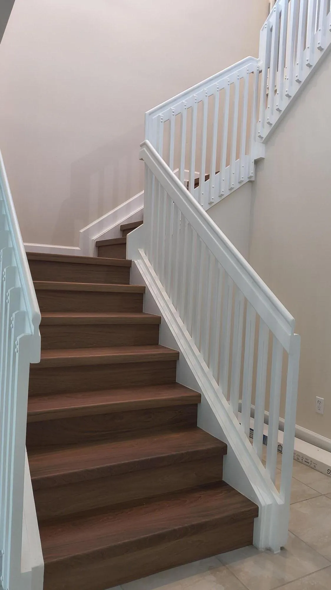 ALL CARPET HAS BEEN REPLACED WITH BEAUTIFUL WOOD LIKE FLOORING