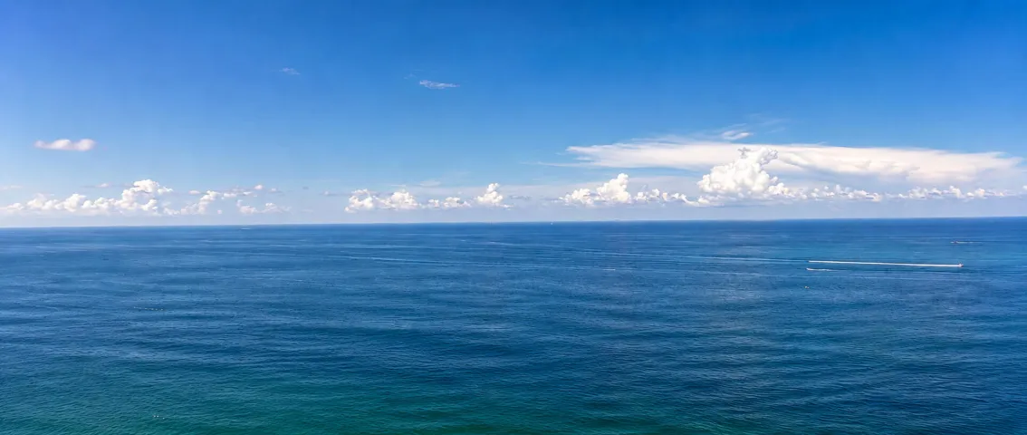 Blue Horizon with Distant Wakes