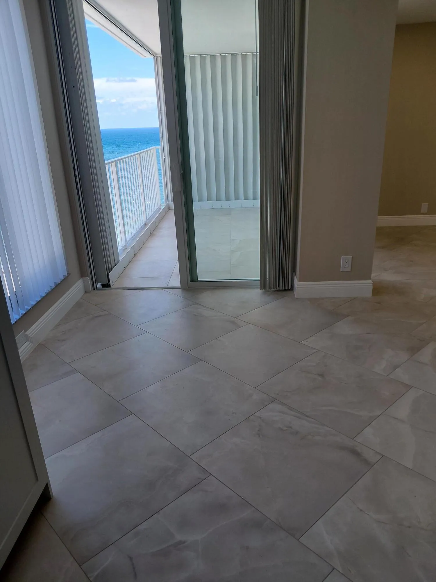 DINING AREA OUT TO BALCONY