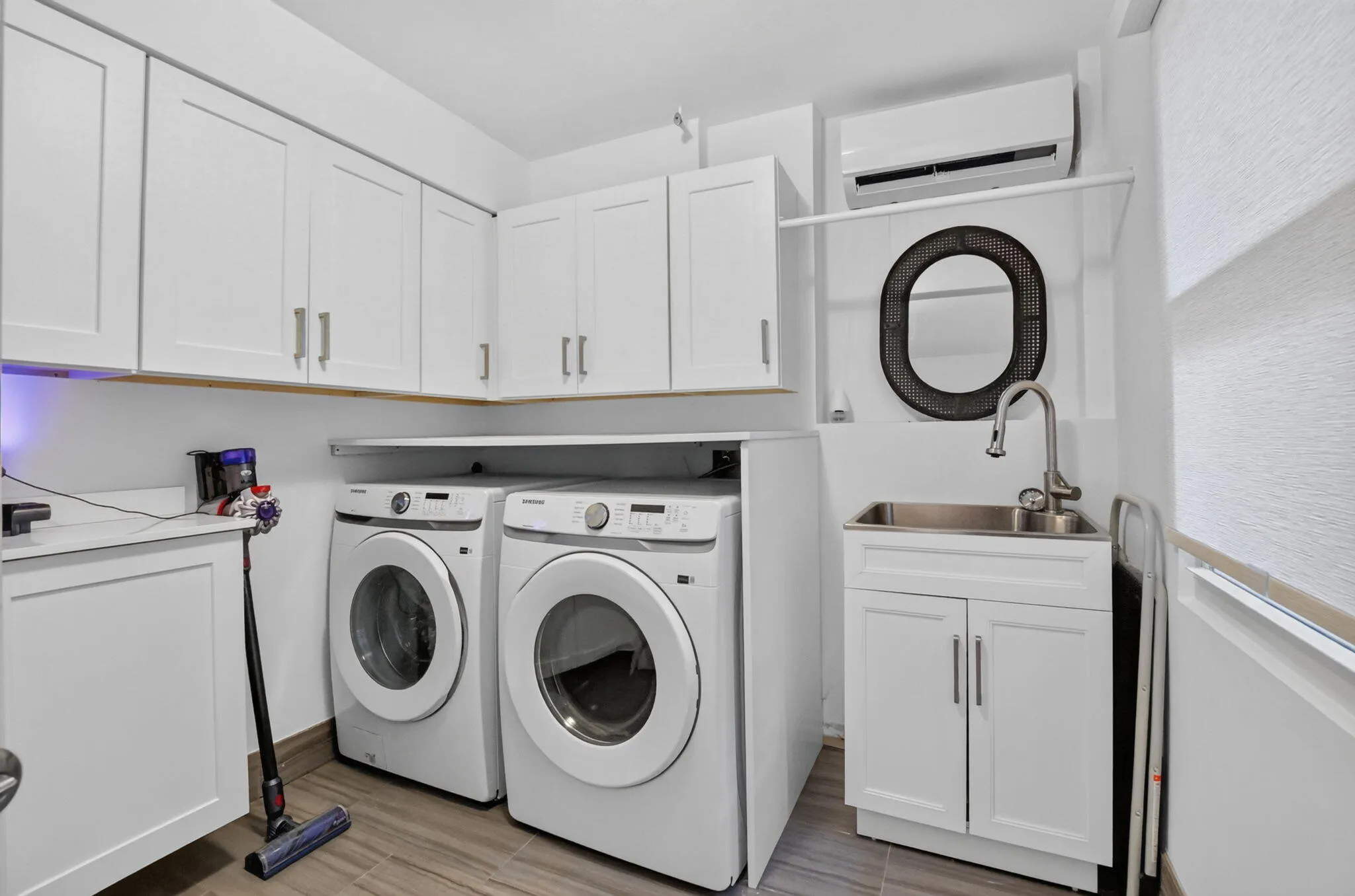 LAUNDRY ROOM: accessible off the family room, the hall to the carport and has an exterior door to the back yard patio... the new window keeps it bright al day!