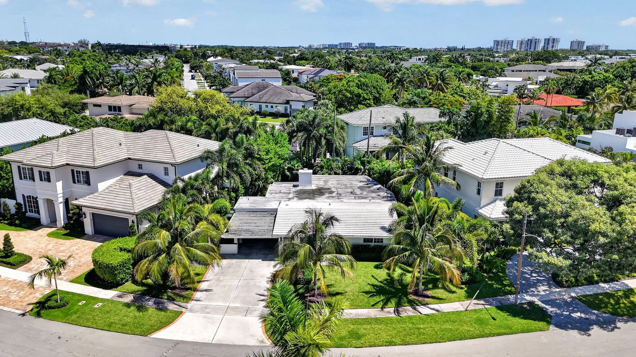 This much desired East Boca Raton (E of US-1) has it all and NO HOA fees!! This home is located on a pie-shaped lot, on a perfectly manicured street surrounded by Custom designed homes.