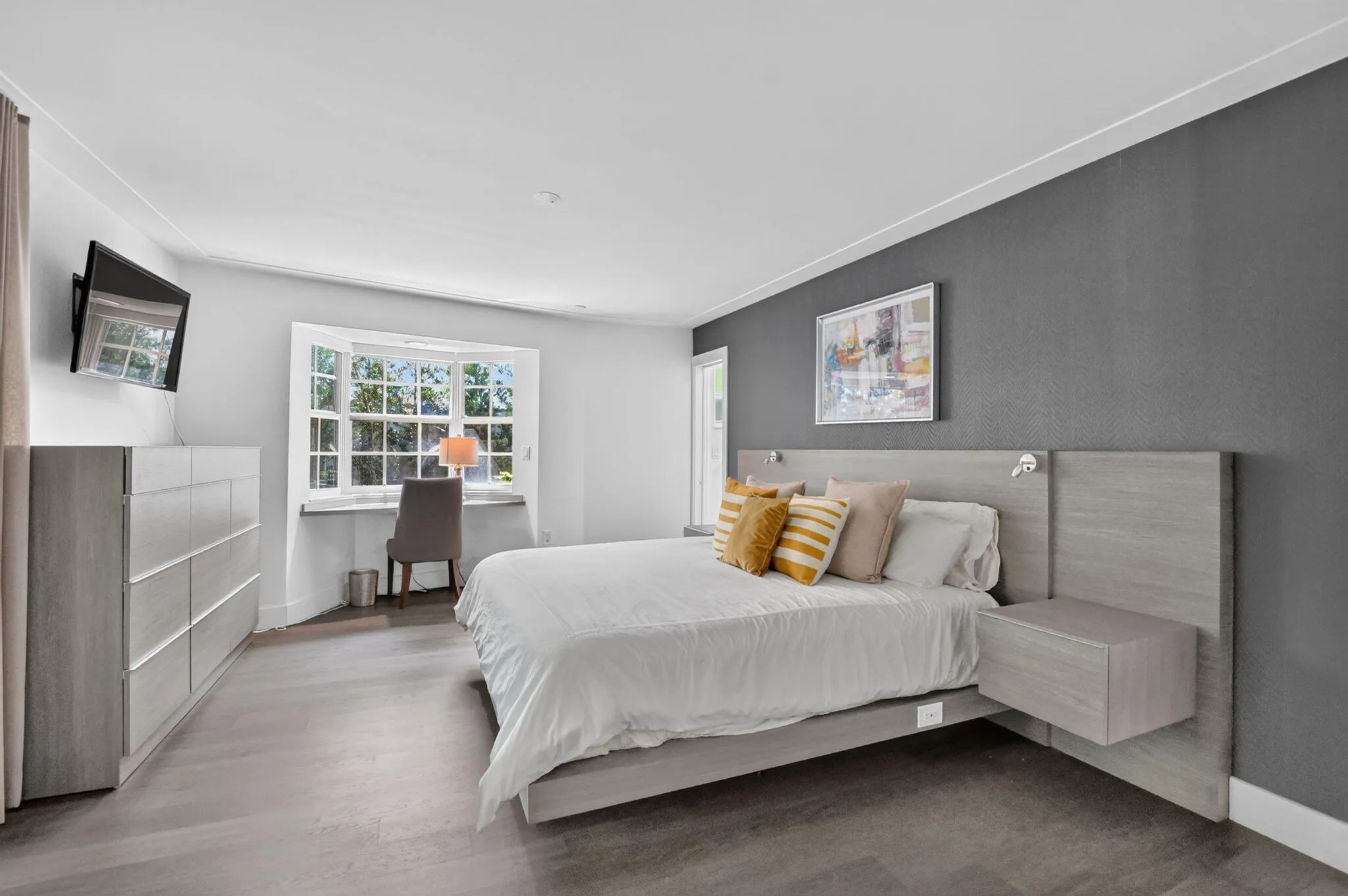 Exceptionally large Private Primary Suite with an inviting east-facing bay window! (The bed in the picture is a king-size bed).