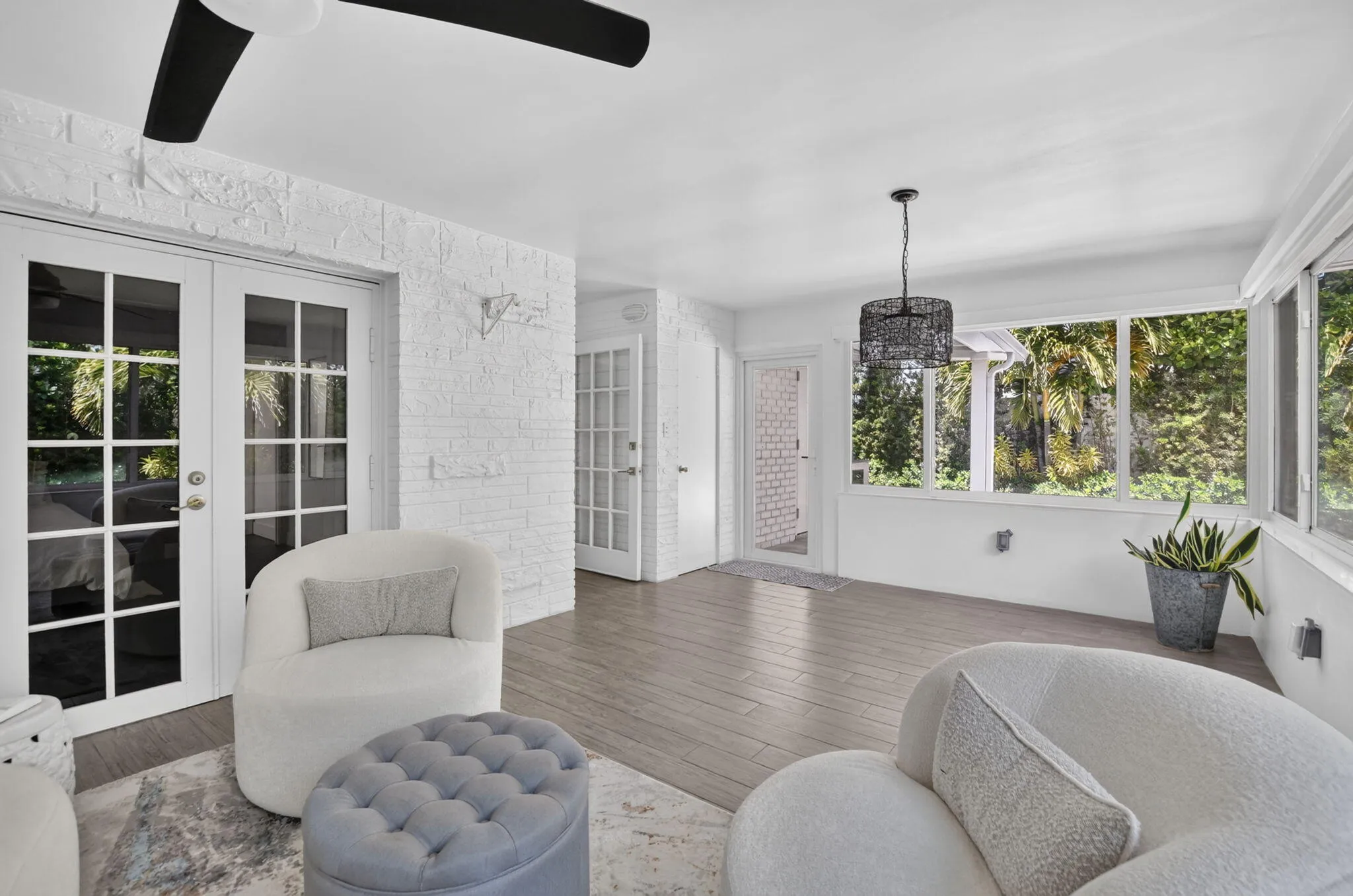 This room has plenty of space for a dining table/desk space, yoga area.. it's up to you!