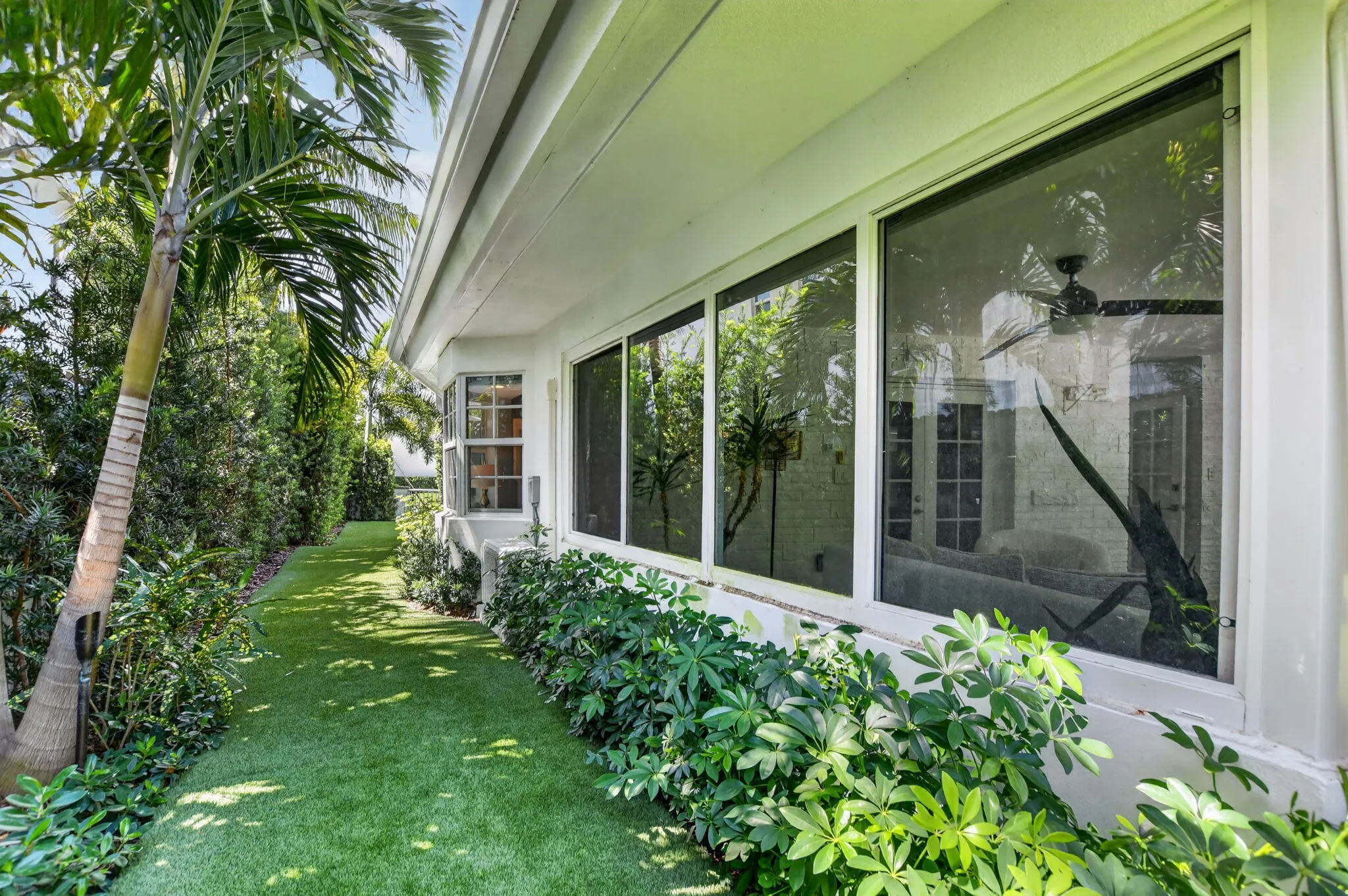 The East and West Side yards enjoy the pleasures of "green & clean" turf year-round...