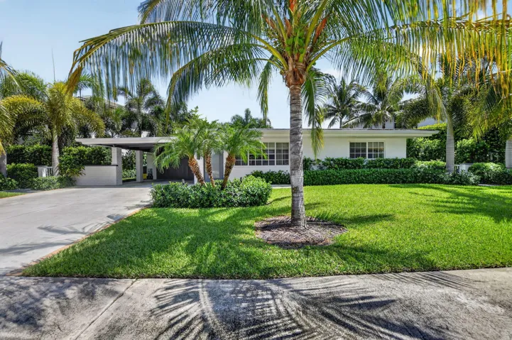 WELCOME HOME to your new East Boca Beautifully updated 3/2 home in Boca's Golden Triangle, just mins to the beach! Front elevation faces South.