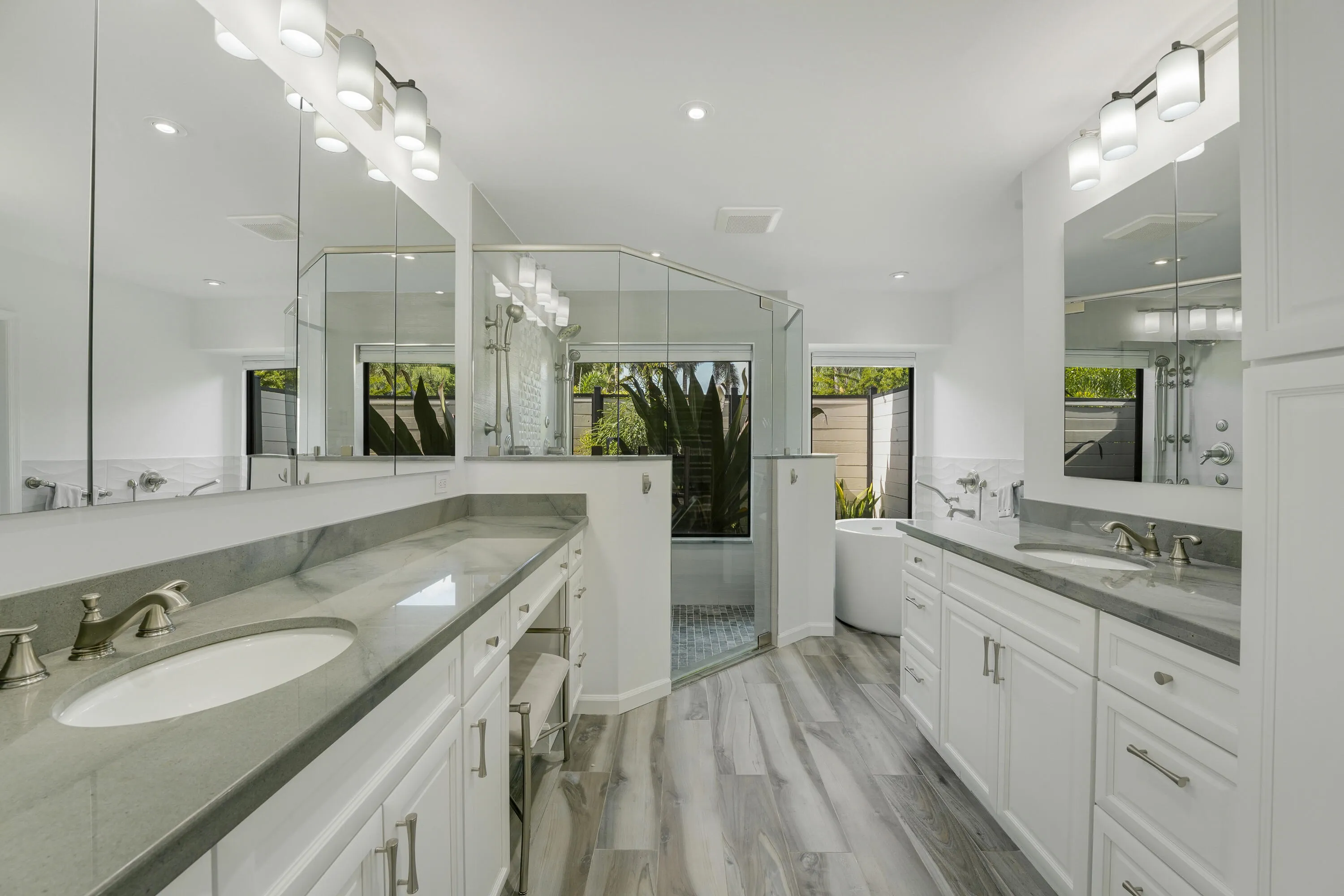 Resortinspired bath with secluded garden views
