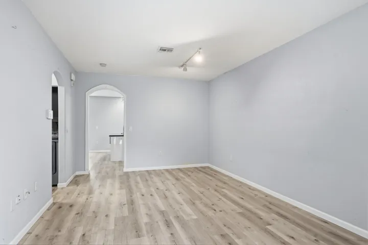 Wood-finish flooring throughout