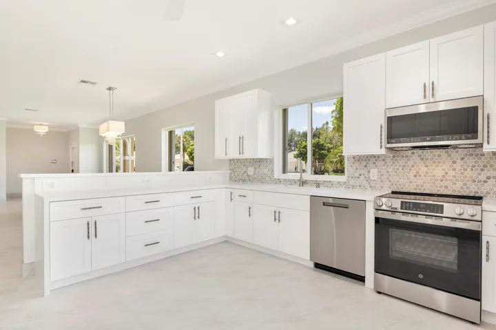 Kit w/Custom designer backsplash, Lg, double pantry w/ wooden shelves