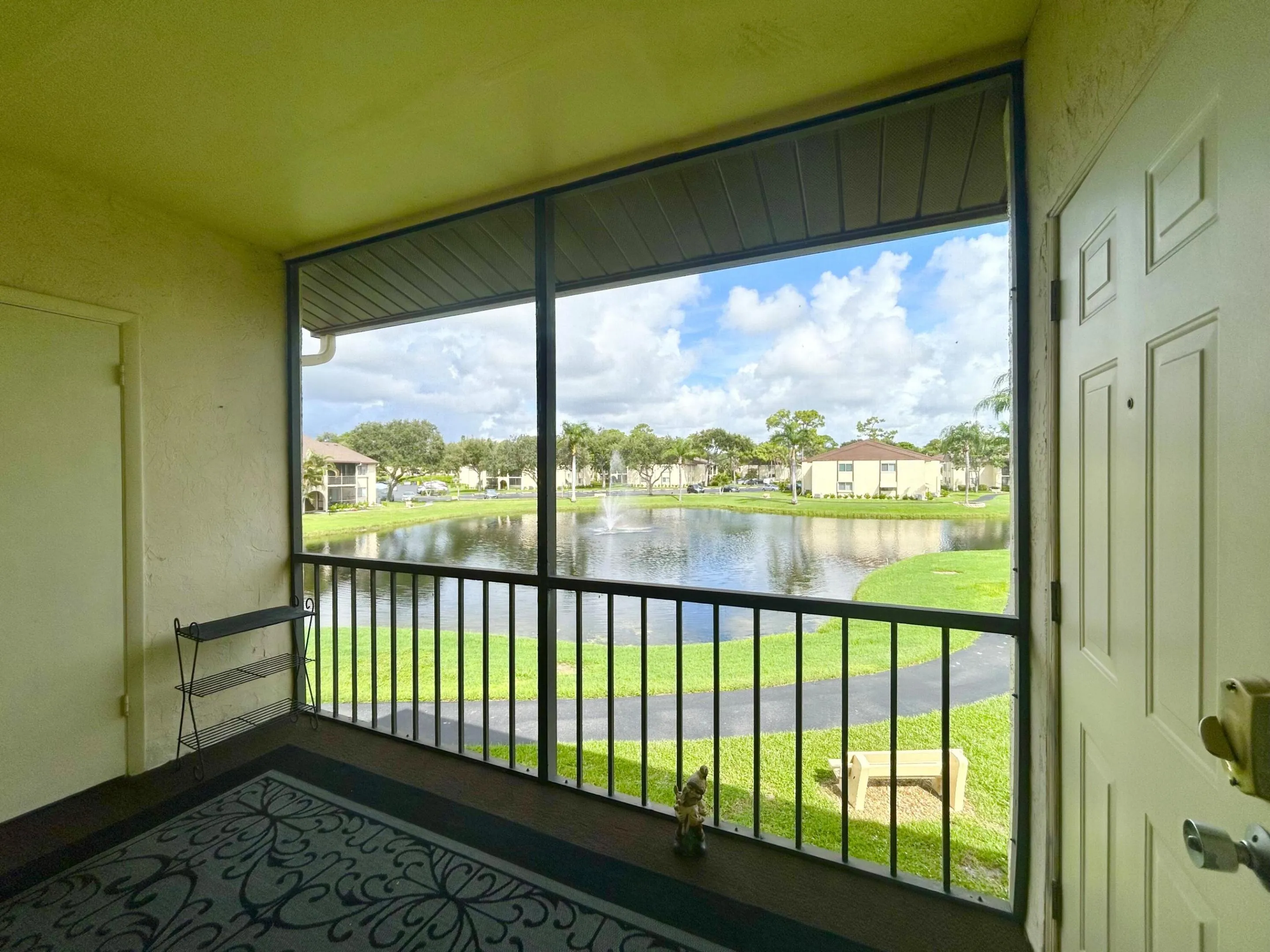 VIEW OF CLUBHOUSE AND POOL