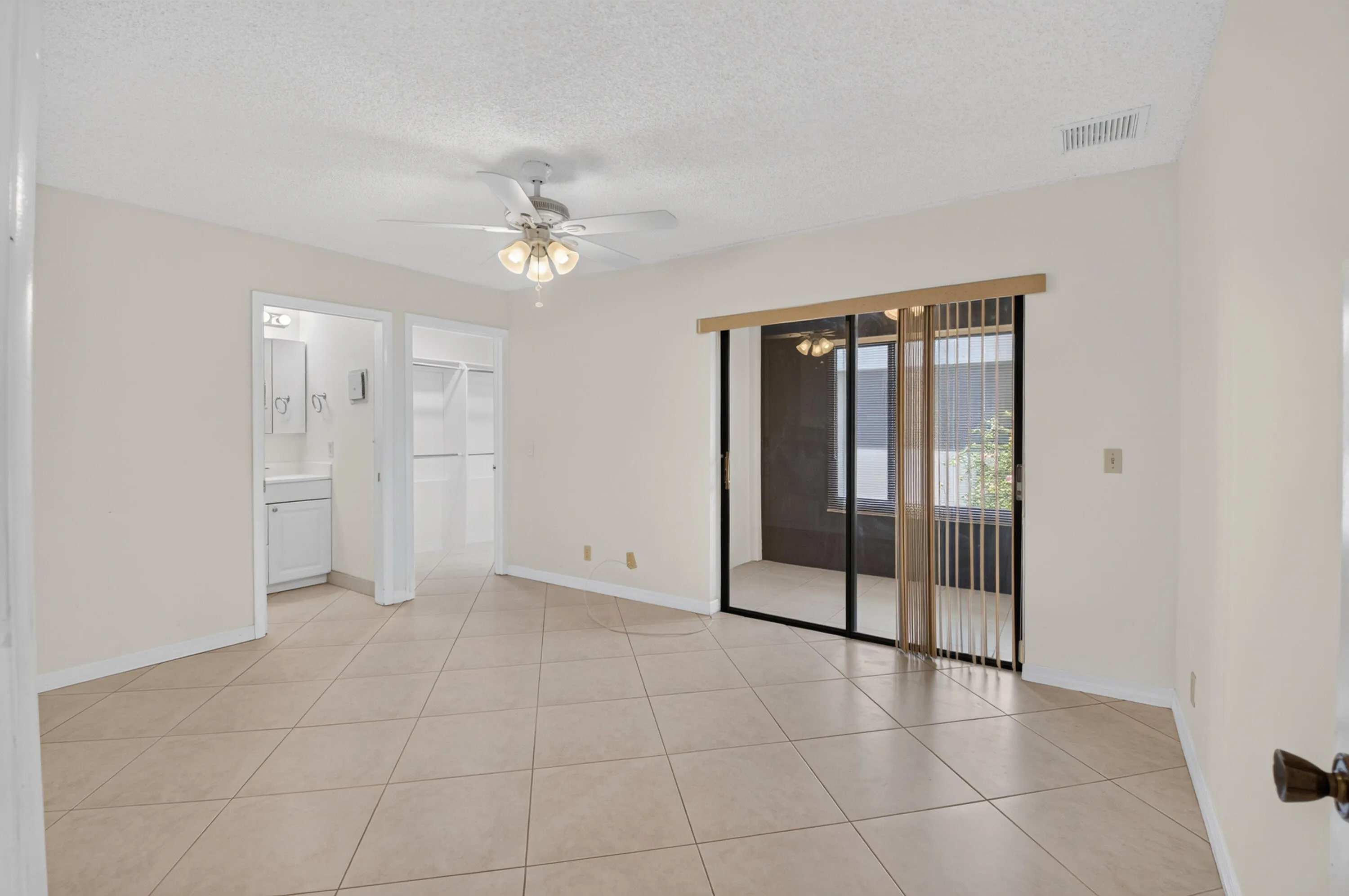 Primary Bedroom With Ensuite and Full Size Washer & Dryer in Closet