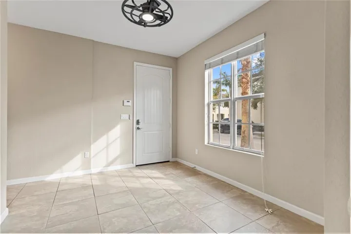 Rear entrance area from garage with half bath