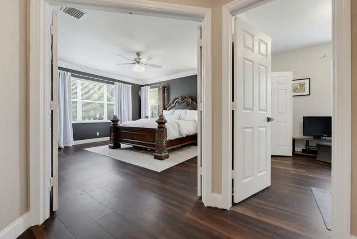 Hallway to Primary & Bedroom 2