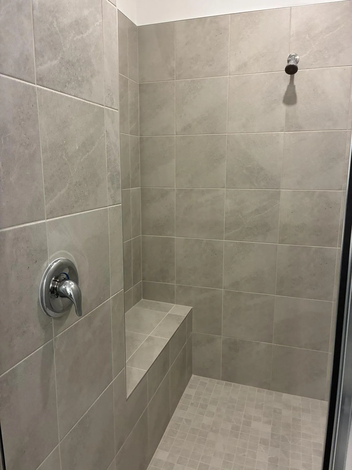 Walk in shower w seat master bath