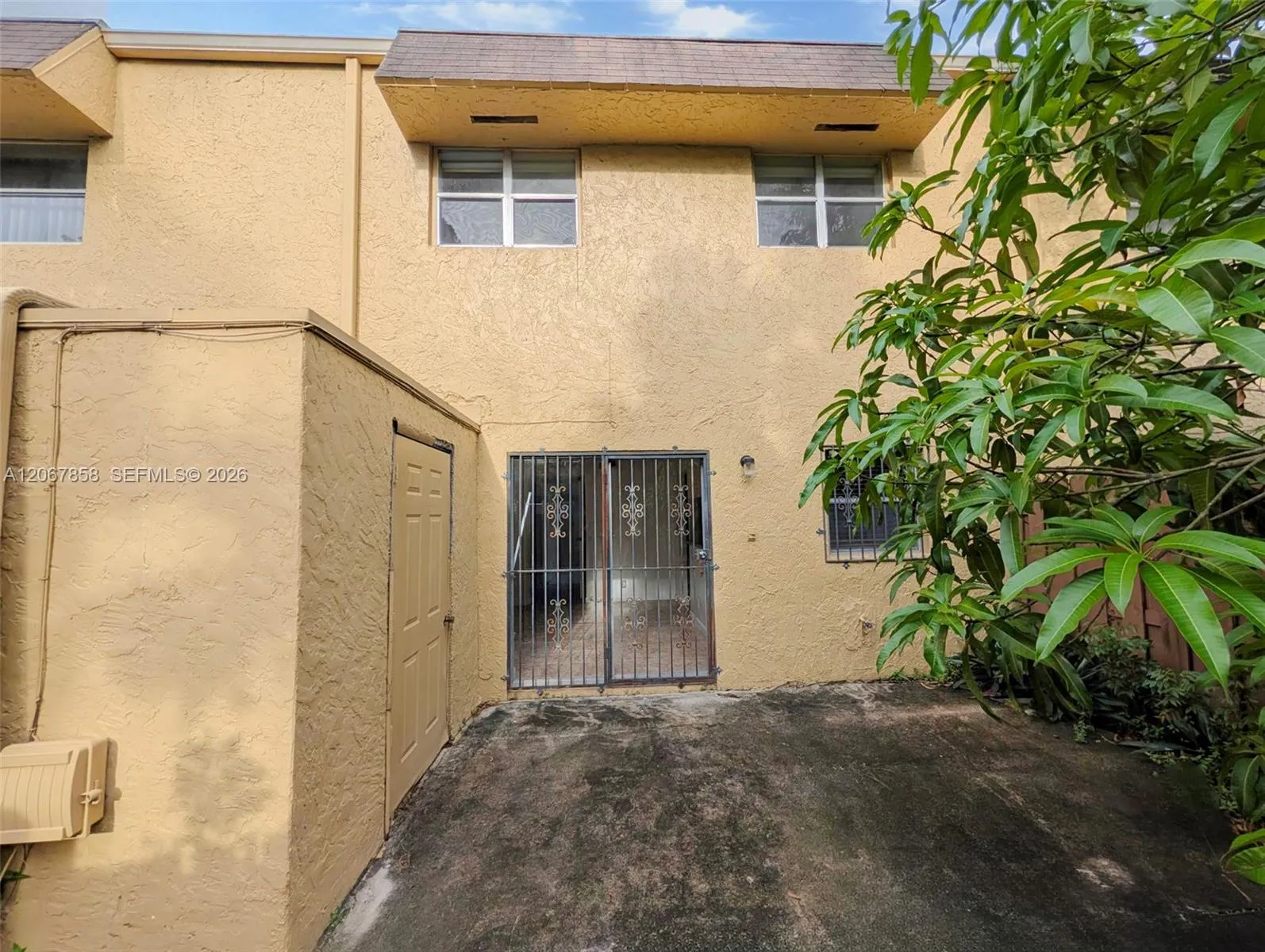 Fenced yard with storage shed