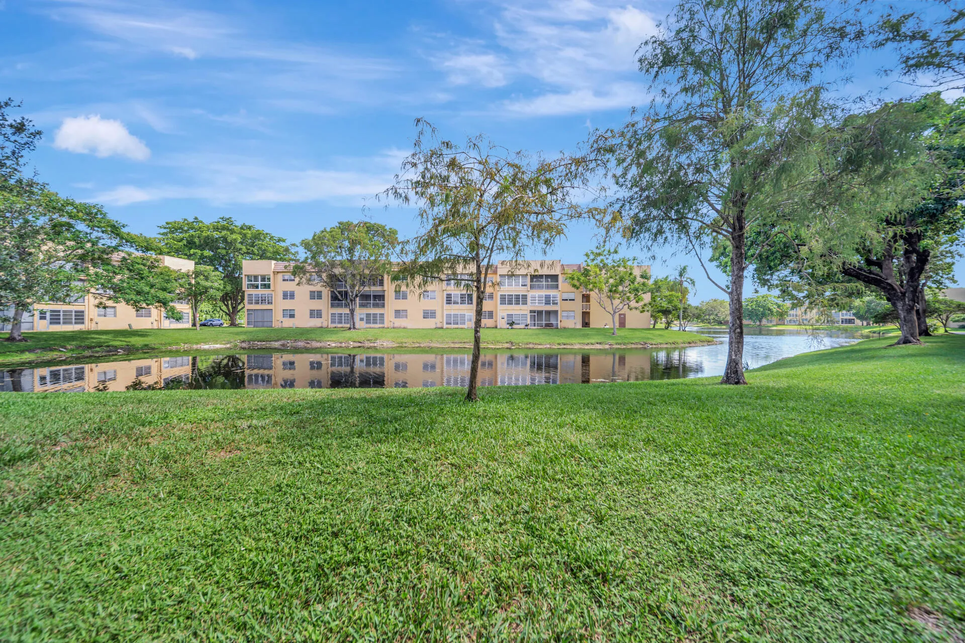 Lovely grassy area and waterview directly outside the unit