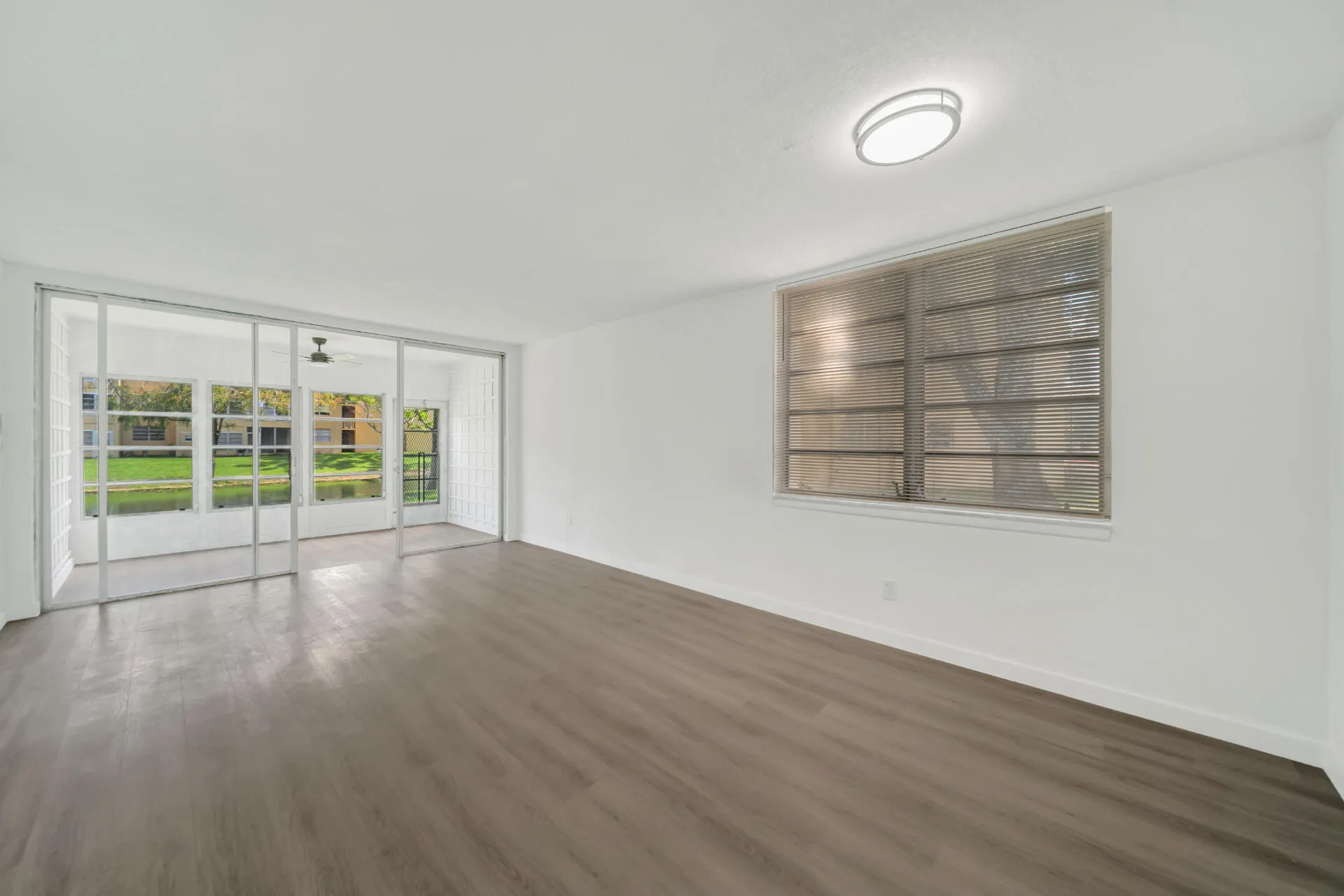 Living Room with entry to Enclosed Sun Room