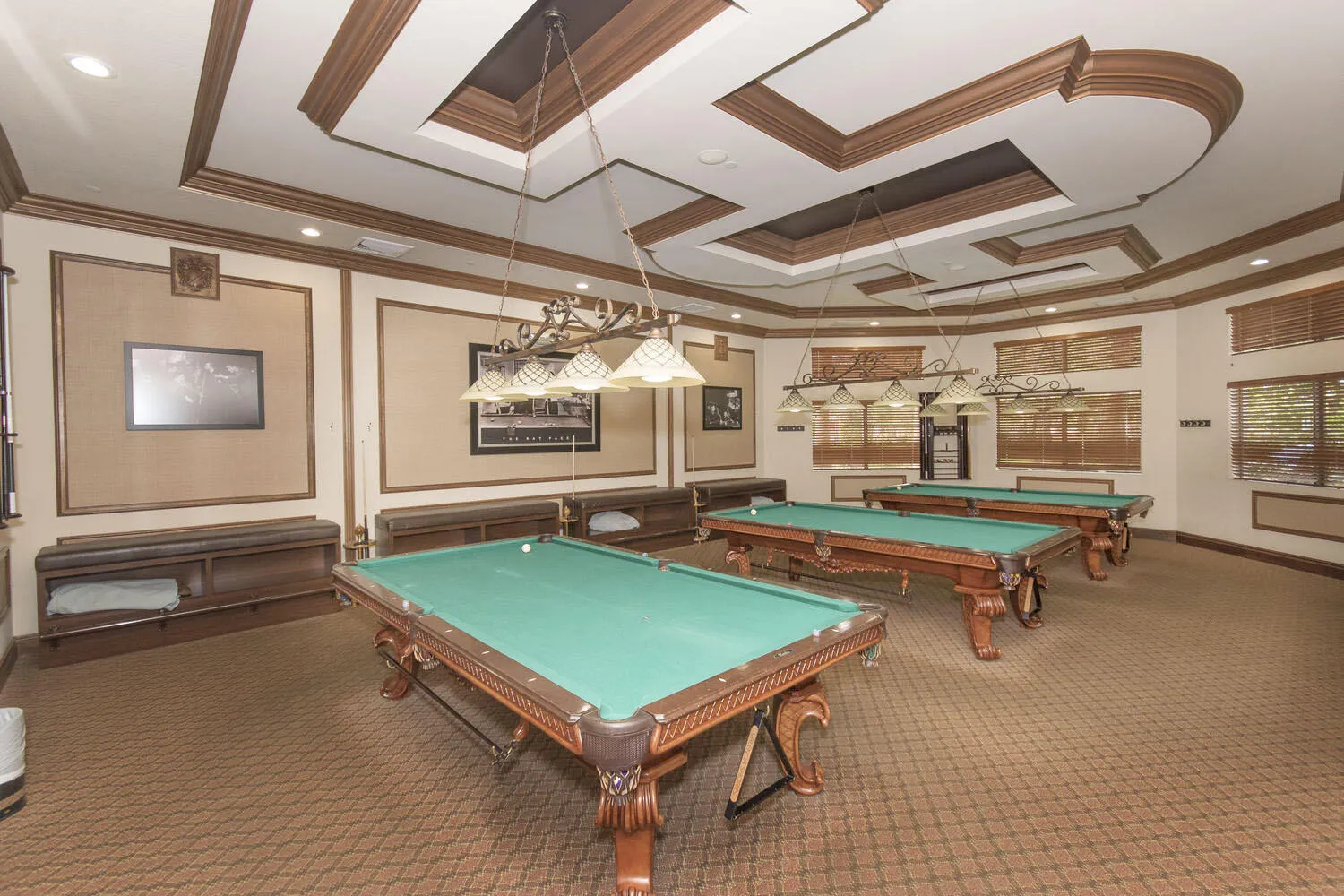 Dedicated billiards room features three tables is one of the many recreational amenities available at the Social Club.