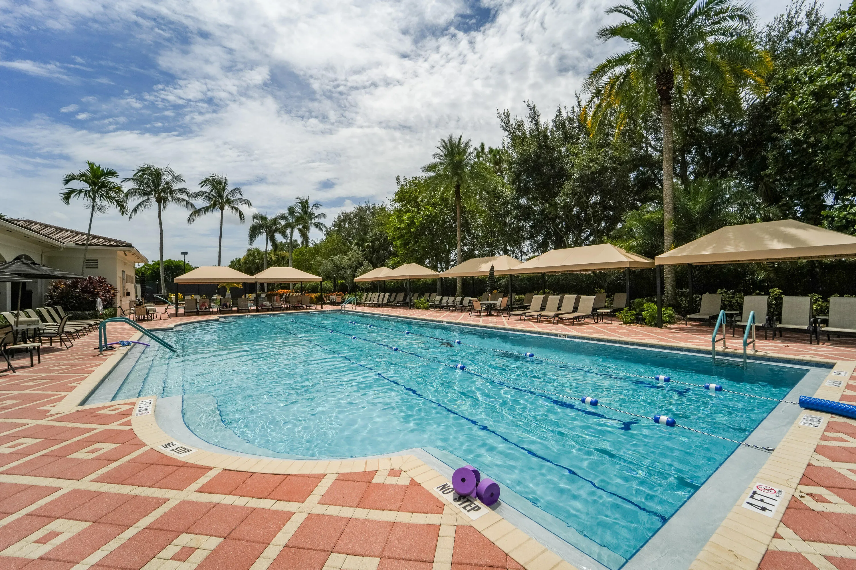 Resort-style Athletic Club pool includes dedicated lanes for lap swimming and generous deck space for relaxing.