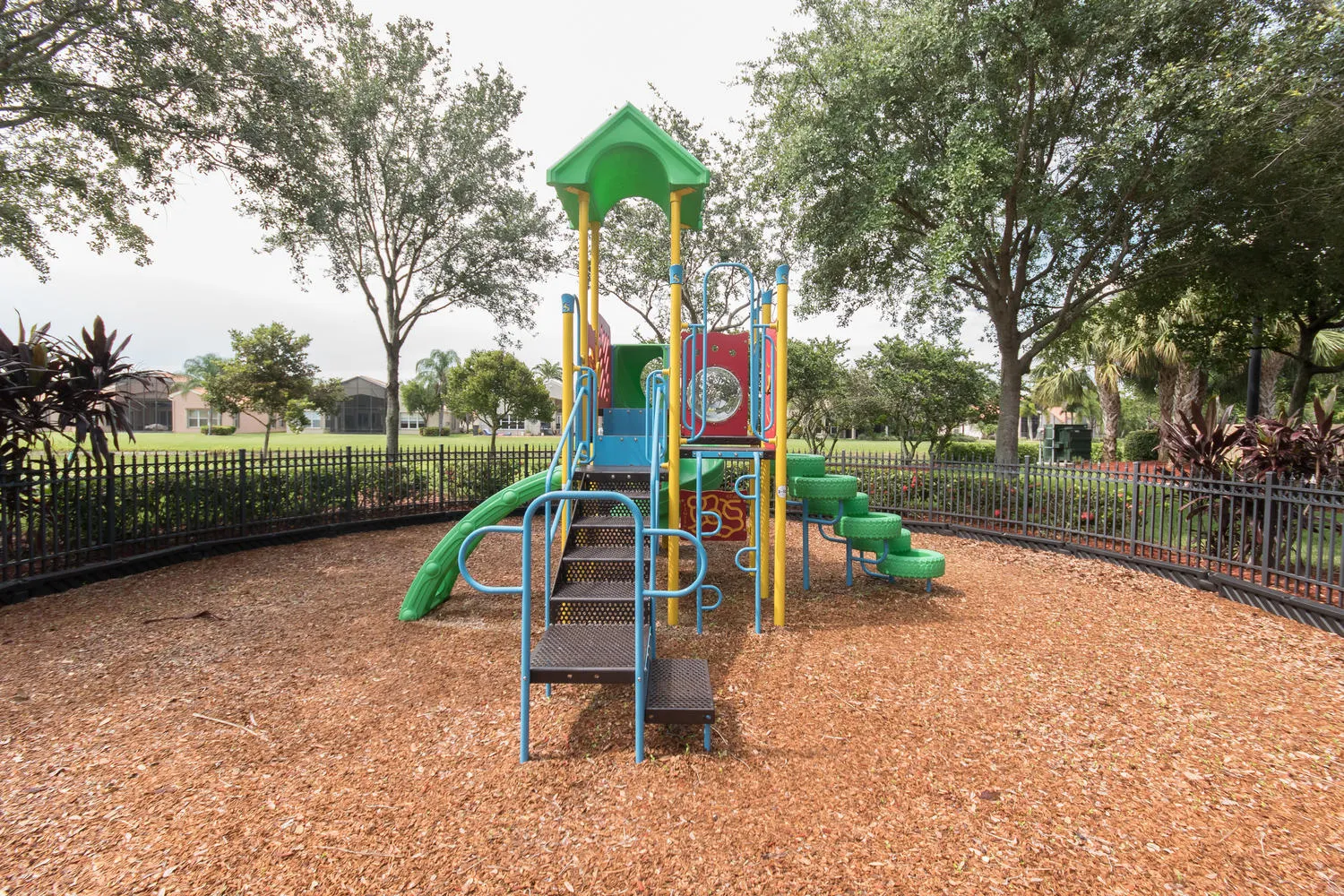 Colorful community playground provides a welcoming recreational space for visiting family and grandchildren.