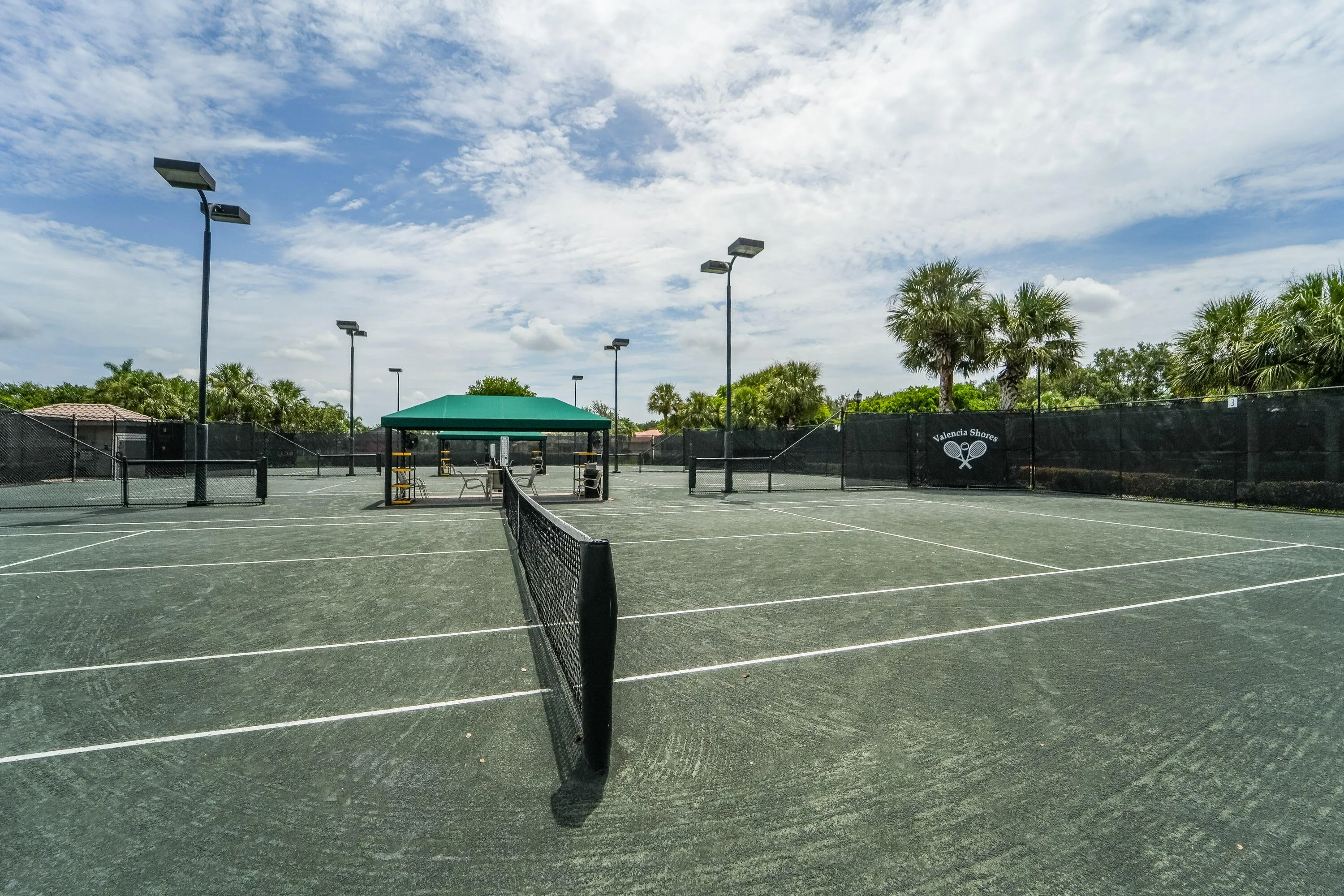 Tennis enthusiasts enjoy a 10-court lighted Har-Tru tennis facility at Valencia Shores.
