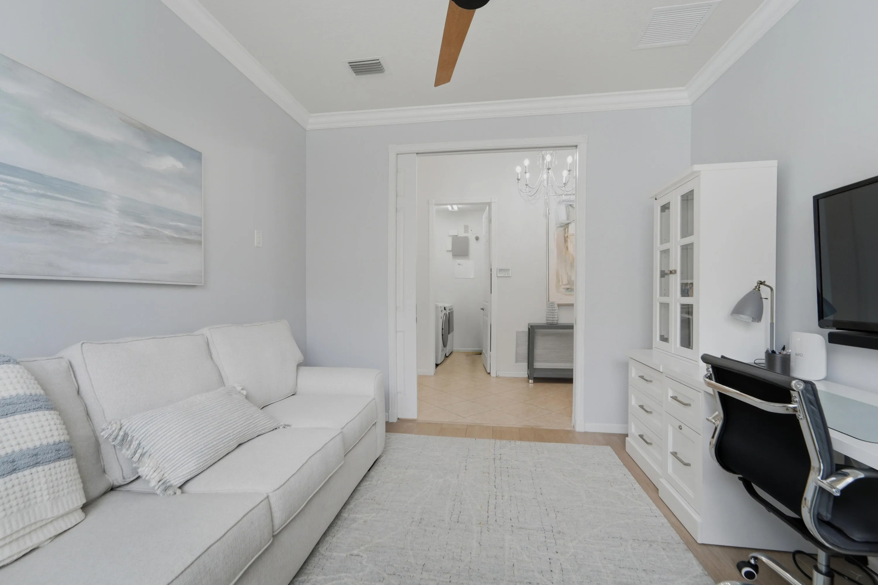Flexible room with double pocket doors can serve as a den, home office, or 3rd bedroom to provide a dedicated space for guests, work, hobbies or organization.