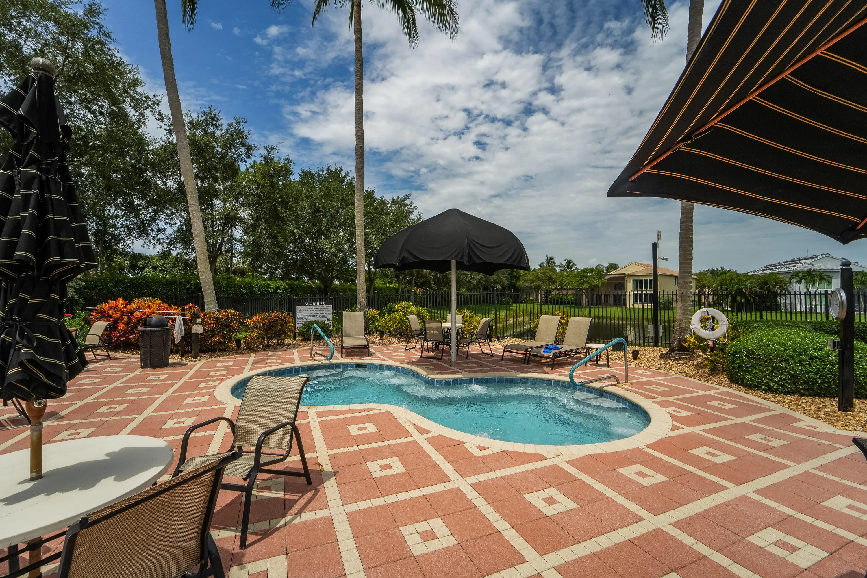 Relax and unwind in the poolside hot tub, part of the Athletic Club’s extensive aquatic amenities.