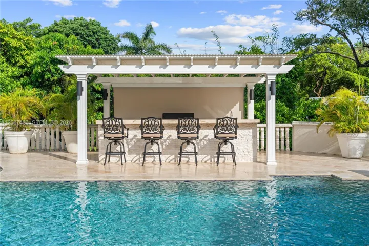 20'x40' with waterfall, gazebo with 4-person bar, built-in grill, refrigerator, ice maker, storage