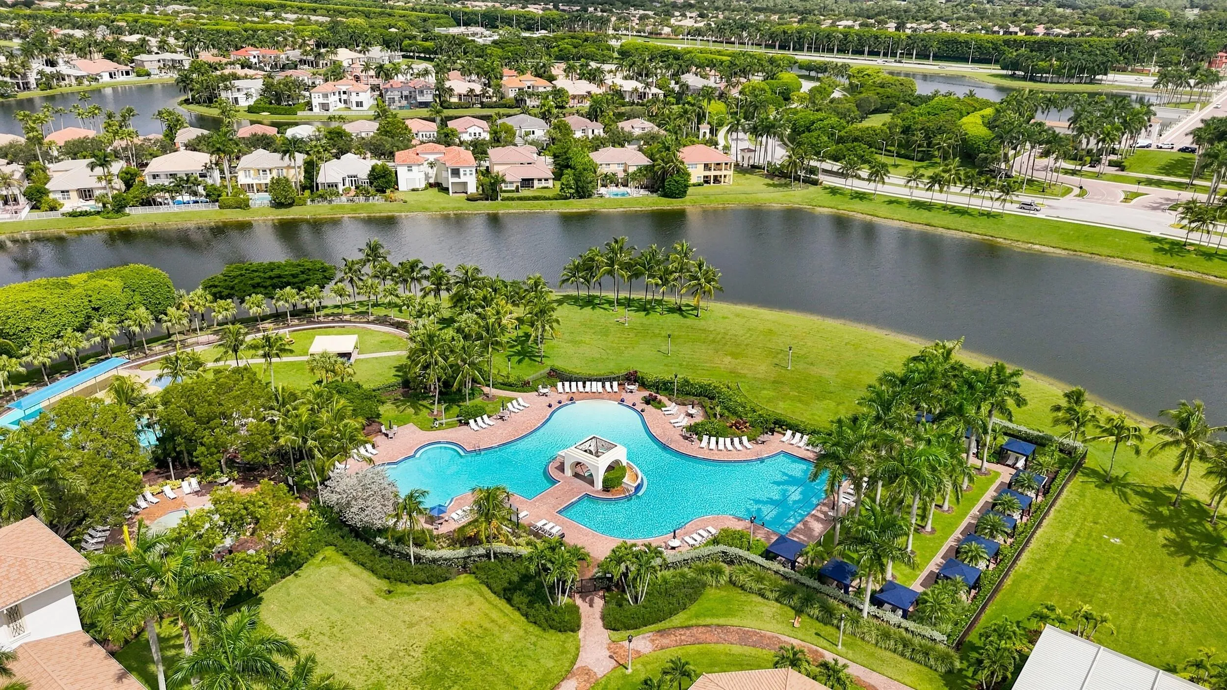Clubhouse has large pool, spa, kiddie pool and open green areas