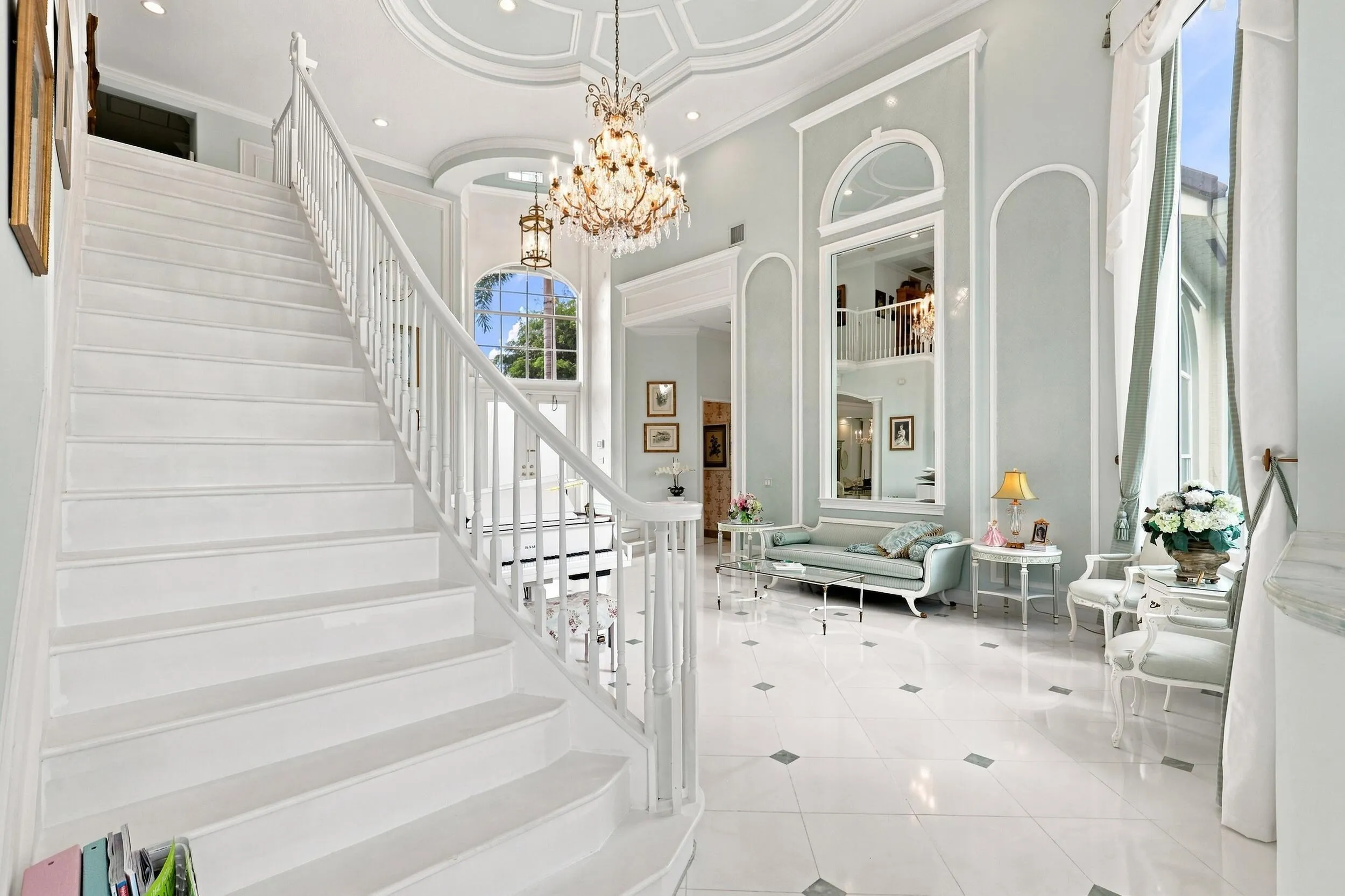 Grand staircase to 3 bedrooms, 3 en suite bathrooms and large loft in 2nd floor