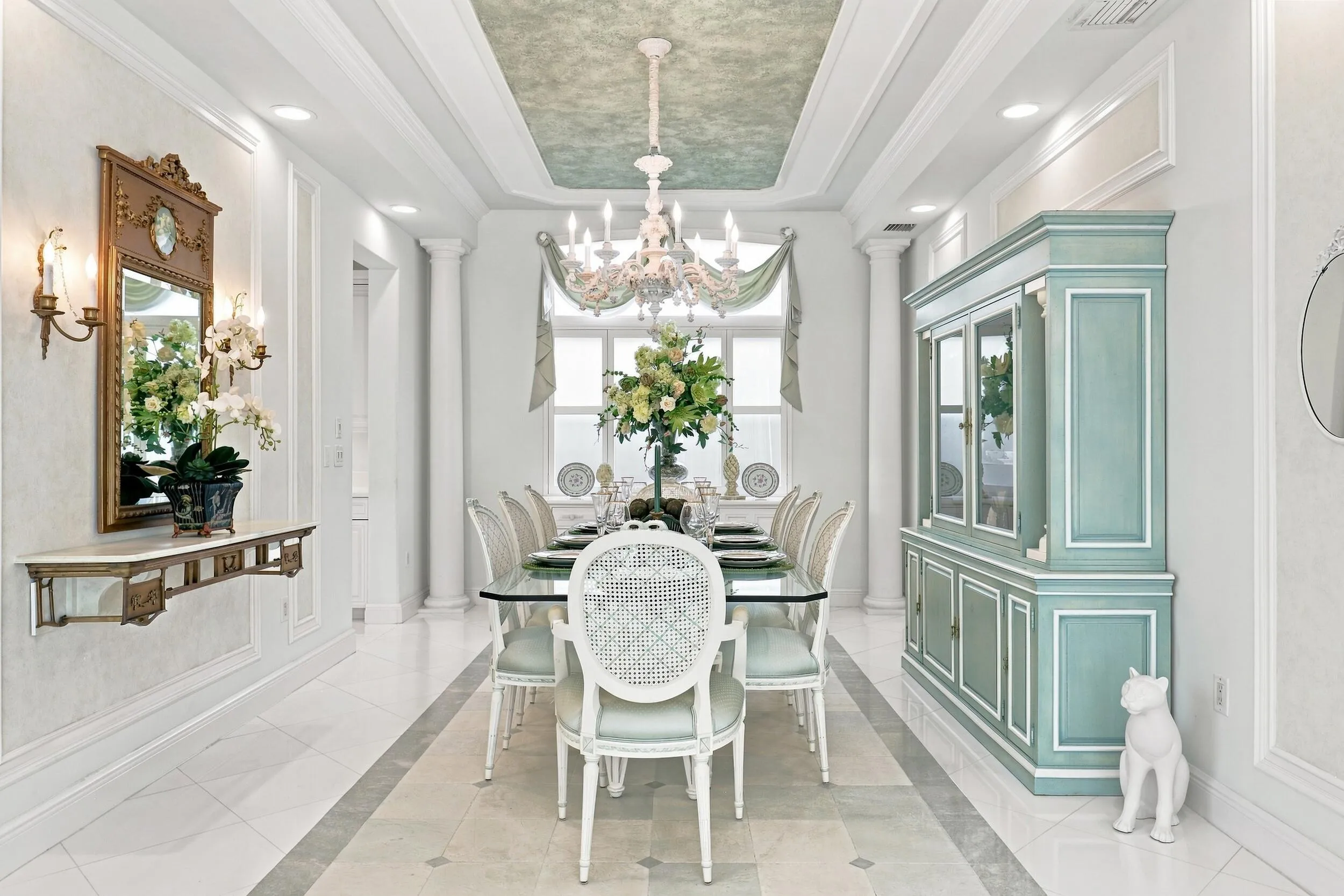 Custom ceiling. Kitchen connects with formal dining room